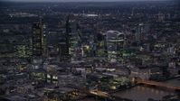 5.5K stock footage aerial video of passing by Central London Skyscrapers, London, England, night Aerial Stock Footage | AX116_148