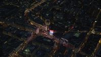 5.5K stock footage aerial video of circling above Piccadilly Circus and city buildings, London, England, night Aerial Stock Footage | AX116_186