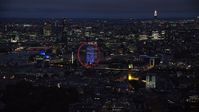 5.5K stock footage aerial video of London Eye, Big Ben by the River Thames, London, England, night Aerial Stock Footage | AX116_194