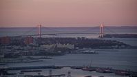 5.5K stock footage aerial video of the Verrazano-Narrows Bridge at sunrise, New York Aerial Stock Footage | AX118_061