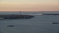 5.5K stock footage aerial video of a wide view of the Verrazano-Narrows Bridge, sunrise, New York City Aerial Stock Footage | AX118_080
