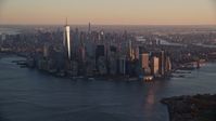 5.5K stock footage aerial video of a slow approach to Lower Manhattan at sunrise, New York City Aerial Stock Footage | AX118_083