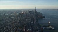 5.5K stock footage aerial video of a wide view of Freedom Tower and Lower Manhattan at sunrise in New York City Aerial Stock Footage | AX118_208E