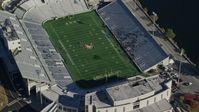 5.5K stock footage aerial video fly away from Michie Stadium at West Point Military Academy in Autumn, West Point, New York Aerial Stock Footage | AX119_178