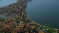 5.5K stock footage aerial video fly over oceanfront mansions in Autumn, Oyster Bay, New York Aerial Stock Footage | AX119_239