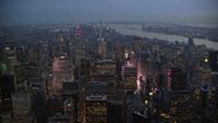 5.5K stock footage aerial video fly over Midtown near Times Square at twilight in New York City Aerial Stock Footage | AX121_102E