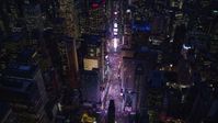 5.5K stock footage aerial video orbit Times Square and high-rises at Night in Midtown, New York City Aerial Stock Footage | AX121_133E