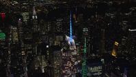 5.5K stock footage aerial video orbit the top of Bank of America Tower at Night in Midtown, New York City Aerial Stock Footage | AX122_118E