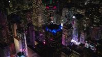 5.5K stock footage aerial video orbit Times Square at Night in Midtown Manhattan, NYC Aerial Stock Footage | AX122_124