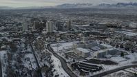 5.5K stock footage aerial video orbit Utah State Capitol and Downtown Salt Lake City with snow at sunrise Aerial Stock Footage | AX124_202