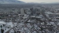 5.5K stock footage aerial video of Downtown Salt Lake City with winter snow at sunrise, Utah Aerial Stock Footage | AX124_221