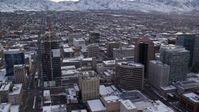 5.5K stock footage aerial video orbit Downtown Salt Lake City and reveal Wasatch Range at sunrise, Utah Aerial Stock Footage | AX124_225
