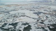 5.5K stock footage aerial video of frozen marshlands near Salt Lake City in wintery Utah Aerial Stock Footage | AX125_019