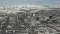 5.5K stock footage aerial video of southern side of Downtown Salt Lake City with winter snow, Utah Aerial Stock Footage | AX126_025