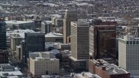 5.5K stock footage aerial video of downtown buildings with winter snow in Salt Lake City, Utah Aerial Stock Footage | AX126_044