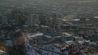 5.5K stock footage aerial video orbit Utah State Capitol and downtown with winter snow at sunset, Salt Lake City Aerial Stock Footage | AX127_090