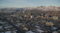 5.5K stock footage aerial video approach and flyby Downtown Salt Lake City with winter snow at sunset, Utah Aerial Stock Footage | AX127_157