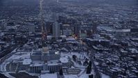 5.5K stock footage aerial video approach north side of state capitol and Downtown SLC with snow at twilight, Utah Aerial Stock Footage | AX128_017