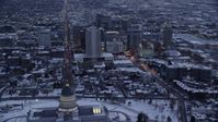 5.5K stock footage aerial video fly over state capitol toward State Street and Downtown Salt Lake City at twilight with winter snow, Utah Aerial Stock Footage | AX128_018
