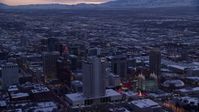5.5K stock footage aerial video orbit Church Office Building and temple in Downtown Salt Lake City with winter snow at twilight, Utah Aerial Stock Footage | AX128_019
