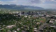5.5K stock footage aerial video of flying by the city's buildings, neighborhoods, sports fields, Downtown Salt Lake City, Utah Aerial Stock Footage | AX129_007