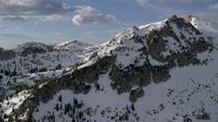 5.5K aerial stock footage video of Lone Peak in the snowy Wasatch Range, Utah Aerial Stock Footage | AX129_122