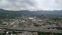 5.5K stock footage aerial video of flying over Interstate 15 with a view of Downtown Salt Lake City, Utah Aerial Stock Footage | AX130_004