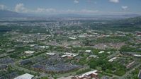 5.5K stock footage aerial video of flying over University of Utah to approach Downtown Salt Lake City, Utah Aerial Stock Footage | AX140_246