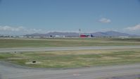 5.5K stock footage aerial video of a wide view of the control tower at Salt Lake City International Airport, Utah Aerial Stock Footage | AX140_267