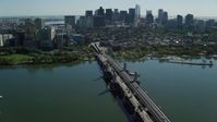 5.5K stock footage aerial video flying over Longfellow Bridge, approach Beacon Hill, Downtown Boston, Massachusetts Aerial Stock Footage | AX142_065
