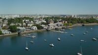 5.5K stock footage aerial video flying by piers, anchored boats, South Boston, Massachusetts Aerial Stock Footage | AX142_213