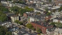 5.5K stock footage aerial video flying by row houses, tilt down, South Boston, Massachusetts Aerial Stock Footage | AX142_236