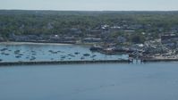5.5K stock footage aerial video approaching a harbor, small coastal community, Plymouth, Massachusetts Aerial Stock Footage | AX143_086