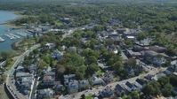 5.5K stock footage aerial video flying over homes and shops, small town, Plymouth, Massachusetts Aerial Stock Footage | AX143_099