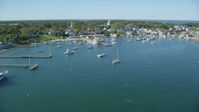 5.5K stock footage aerial video flying over moored boats, approaching Edgartown, Martha's Vineyard, Massachusetts Aerial Stock Footage | AX144_134