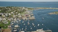 5.5K stock footage aerial video orbiting small coastal town, piers, Edgartown, Martha's Vineyard, Massachusetts Aerial Stock Footage | AX144_139
