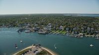 5.5K stock footage aerial video orbiting small coastal town, piers, Edgartown, Martha's Vineyard, Massachusetts Aerial Stock Footage | AX144_141