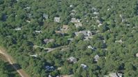 5.5K stock footage aerial video flying by island homes, forest, Edgartown, Martha's Vineyard, Massachusetts Aerial Stock Footage | AX144_150