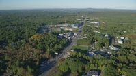 6k stock footage aerial video flying over Boston Providence Highway, warehouses, autumn, Walpole, Massachusetts Aerial Stock Footage | AX145_121