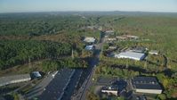 6k stock footage aerial video flying over Boston Providence Highway, warehouses, autumn, Walpole, Massachusetts Aerial Stock Footage | AX145_122