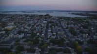 6k stock footage aerial video of Dorchester Heights Monument, row houses, South Boston, Massachusetts, twilight  Aerial Stock Footage | AX146_115