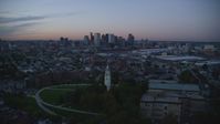 6k stock footage aerial video of Dorchester Heights Monument, skyline, South Boston, Massachusetts, twilight Aerial Stock Footage | AX146_121