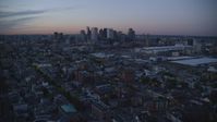 6k stock footage aerial video approaching downtown skyline, South Boston, Massachusetts, twilight Aerial Stock Footage | AX146_122