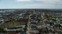 6k stock footage aerial video flying over Congress Street, approach Portland City Hall and a cathedral, Portland, Maine Aerial Stock Footage | AX147_349