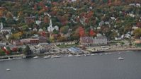 6k stock footage aerial video flying by small waterfront town, church, autumn, Bath, Maine Aerial Stock Footage | AX147_414