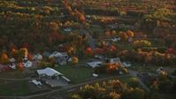 5.5K stock footage aerial video orbiting church in a small rural town, autumn, Searsmont, Maine, sunset Aerial Stock Footage | AX149_182