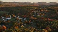 5.5K stock footage aerial video orbiting church, small rural town, colorful trees in autumn, Searsmont, Maine, sunset Aerial Stock Footage | AX149_183