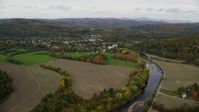 5.5K stock footage aerial video flying over small farms Ammonoosuc River, approach rural town, autumn, Woodsville, New Hampshire Aerial Stock Footage | AX150_283