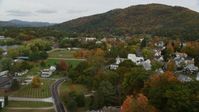 5.5K stock footage aerial video flying over Hospital Road, small rural town, autumn, Woodsville, New Hampshire Aerial Stock Footage | AX150_293