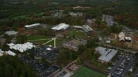 5.5K stock footage aerial video  flying by Southern New Hampshire University, autumn, Hooksett, New Hampshire Aerial Stock Footage | AX152_034
